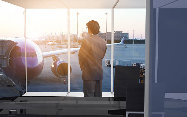 istock Businessman looking air plane 614405696