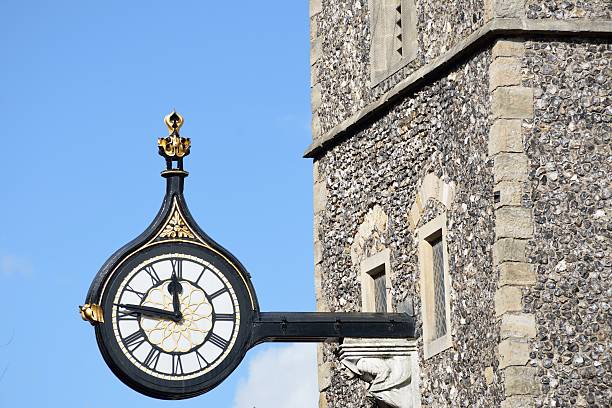 istock Antique roman style  clock on side  norman tower 614405704