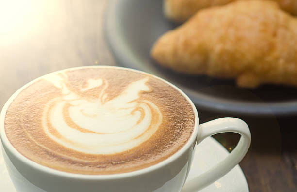 istock Coffee cappuccino on a wooden table. 614406854