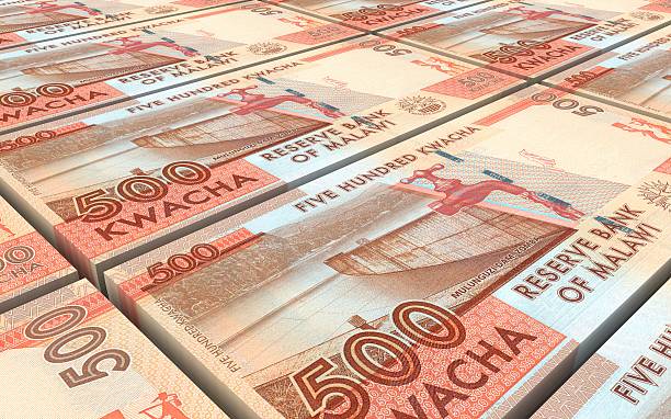 istock Malawi kwacha bills stacked background. 614406882