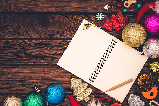 istock Greeting, Blank paper notebook With Christmas decoration on wood 614407852