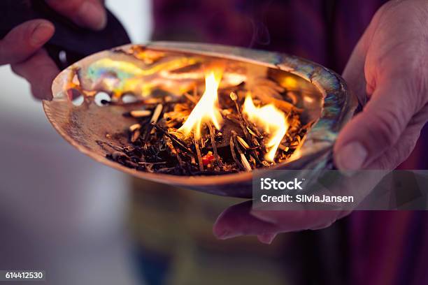 Healing Ceremony Burning Incense In A Shell Stock Photo - Download Image Now - Ceremony, Incense, Fire - Natural Phenomenon