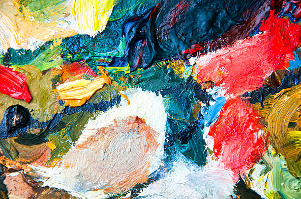 istock Oil paints multicolored closeup abstract background 614414624