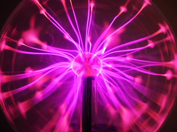 istock Purple pink Plasma filaments in plasma globe or ball 614414850