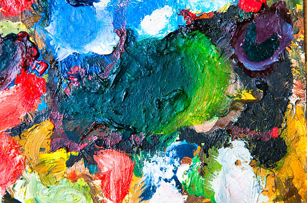 istock Oil paints multicolored closeup abstract background 614415134