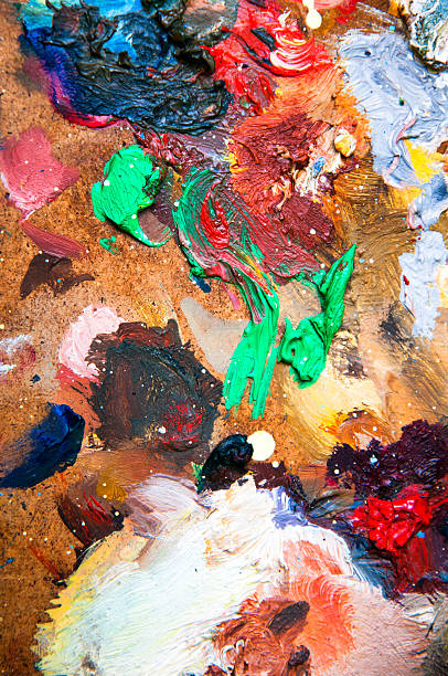 istock Oil paints multicolored closeup abstract background 614415662