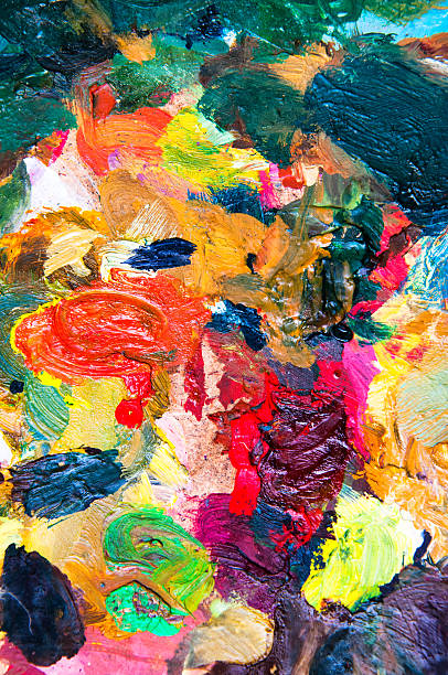 istock Oil paints multicolored closeup abstract background 614416450