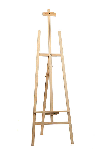 istock Wooden easel on white background 614417290