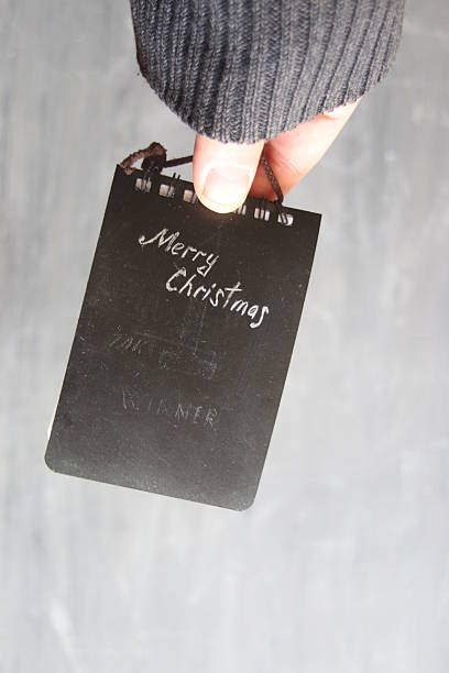 istock Merry Christmas - tag with the inscription. 614418206