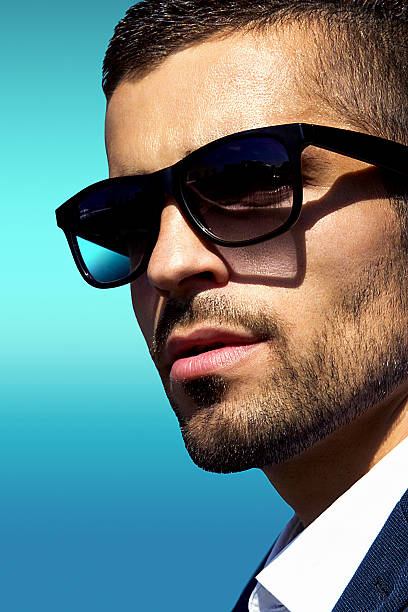 istock man wearing sunglasses portrait 614418214