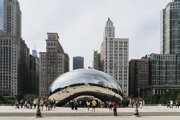 Millennium Park Chicago USA - September 24 2015: Cloud Gate also known as the Bean is one of the parks major attractions.