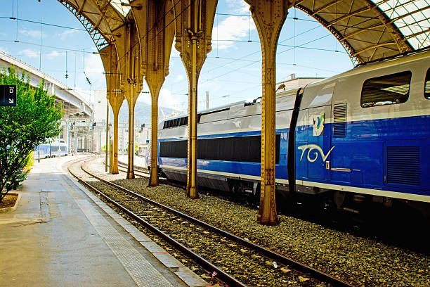 Nice, France - July 30, 2015: The railway platform at Nice station with a TGV train arriving.