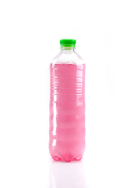 pink sparkling purified water on a light gray table - carbonic acid imagens e fotografias de stock