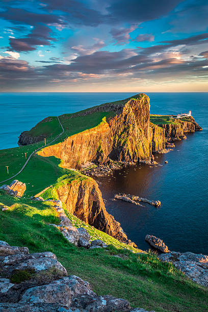 istock Neist point lighthouse in Isle of Skye, Scotland 614423340