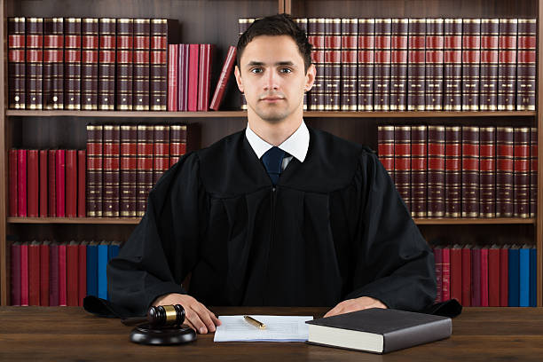 istock Portrait Of Confident Judge 614424380