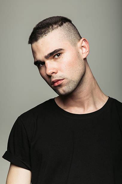 istock Close up studio shot of brutal guy. 614426106