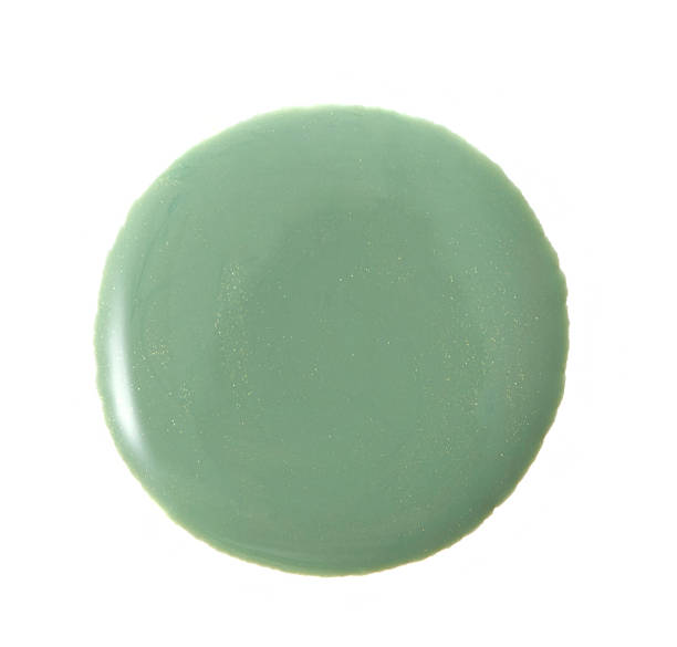 istock Green color abstract shape nail varnish 614427218