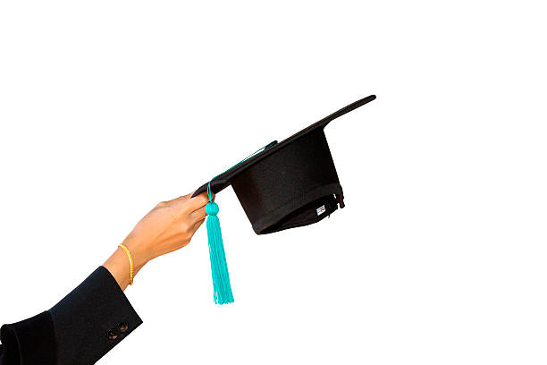 istock congratulations throwing graduation Students with hats isolated 614427338