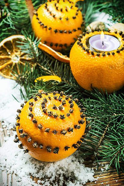 istock Christmas decorations and  oranges  toys 614427432