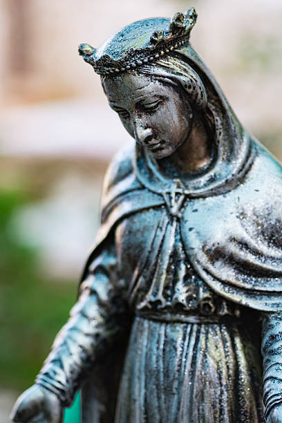 istock Bronze statue of the virgin mary 614428266