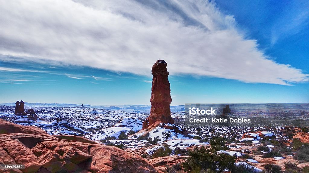 Phallic Rock Hoodoo Formation, Garden of Eden, Arches National Park Sky, Rock Spire Formations, Arches National Park, Utah. Snow covered ground. Penis Stock Photo