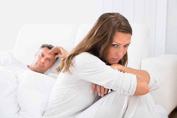 istock Unhappy Couple In Bedroom 614429440