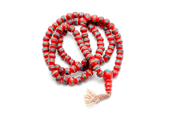 istock Buddhist Mala Prayer Beads from bone yak. Isolated on white. 614432636