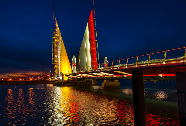 istock Twin Sails lifting bridge and reflections, Poole Harbour in Dorset 614434004