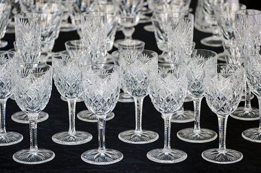 Assorted empty transparent glass products isolated on white background