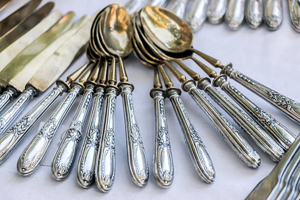 istock golden silver carven spoons 614434688