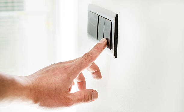 istock The process of turning on the light 614436288
