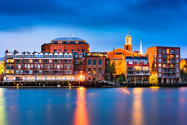 Portsmouth, New Hampshire Skyline Portsmouth, New Hampshire, USA town skyline on the Piscataqua River. portsmouth nh stock pictures, royalty-free photos & images