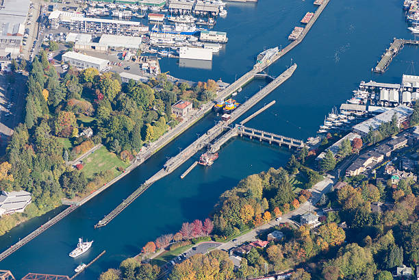 Ballard Locks Aerial View Seattle, Washington, USA - October 12, 2016: Seattle, Washington, USA - October 12, 2016, An aerial view of the Hiram M. Chittenden - Ballard Locks on an autumn afternoon ballard-seattle stock pictures, royalty-free photos & images