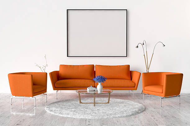 istock Living room - on the wall an empty picture frame 614440204
