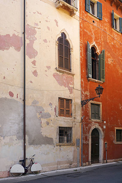 istock Old street in Verona with bicycle 614441422