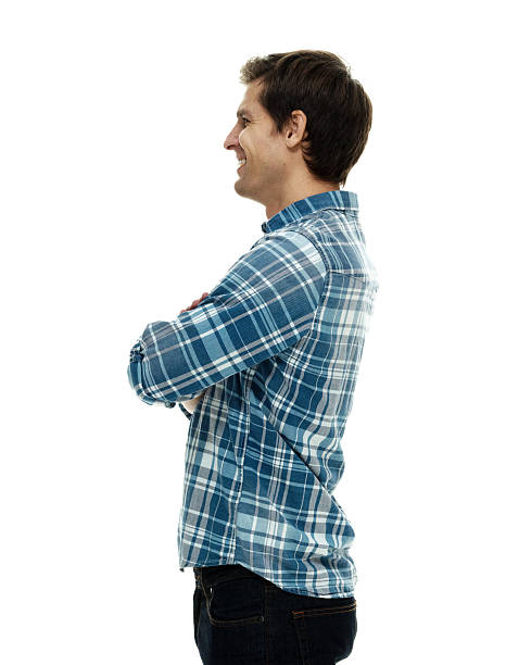 istock Smiling casual man standing with arms crossed 614447968