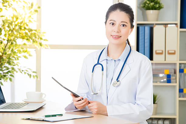 istock doctor using digital tablet to research patient's medical case 614449374