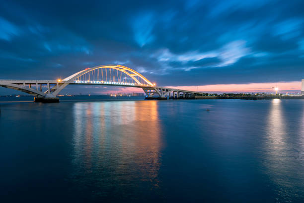 istock Xiamen wuyuan bridge with lighting at dawn 614494066