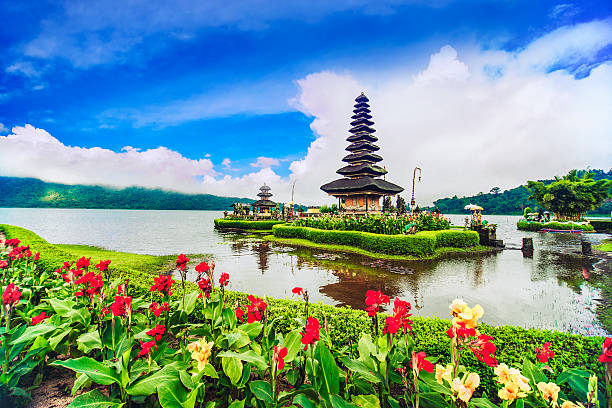 Pura Ulun Danu Beratan the Floating Temple in Bali, Indonesia The Ulun Danu Beratan or the Floating Temple is both a famous picturesque landmark and a significant temple complex located on the western side of the Beratan Lake in Bedugul, central Bali, Indonesia. floating temple in lake bedugul bali stock pictures, royalty-free photos & images