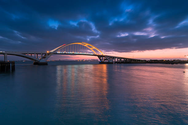 istock Xiamen wuyuan bridge with lighting at dawn 614494192