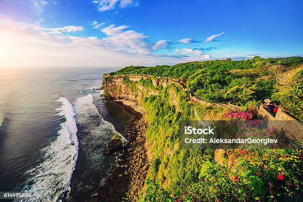 Cliff At Uluwatu Temple On Sunset In Bali Indonesia Stock Photo - Download Image Now