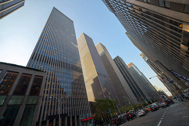 istock Look to the sky surrounded by skyscrapers 614496478