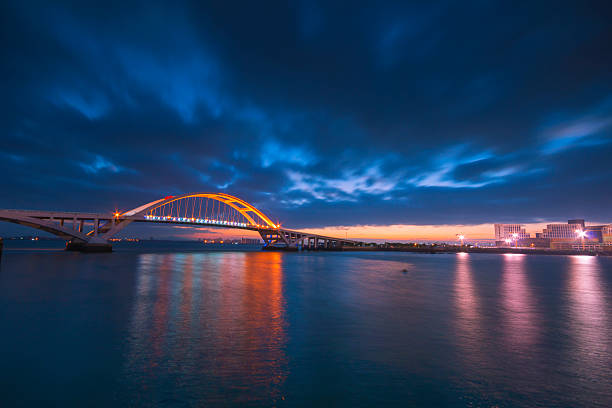 istock Xiamen wuyuan bridge with lighting at dawn 614496942
