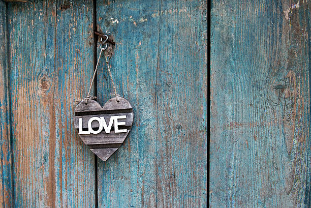 istock Rustic Love sign on an old blue weathered door 614500178