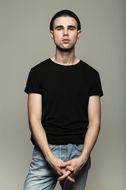 istock Man in black t-stirt calmly into camera 614502878