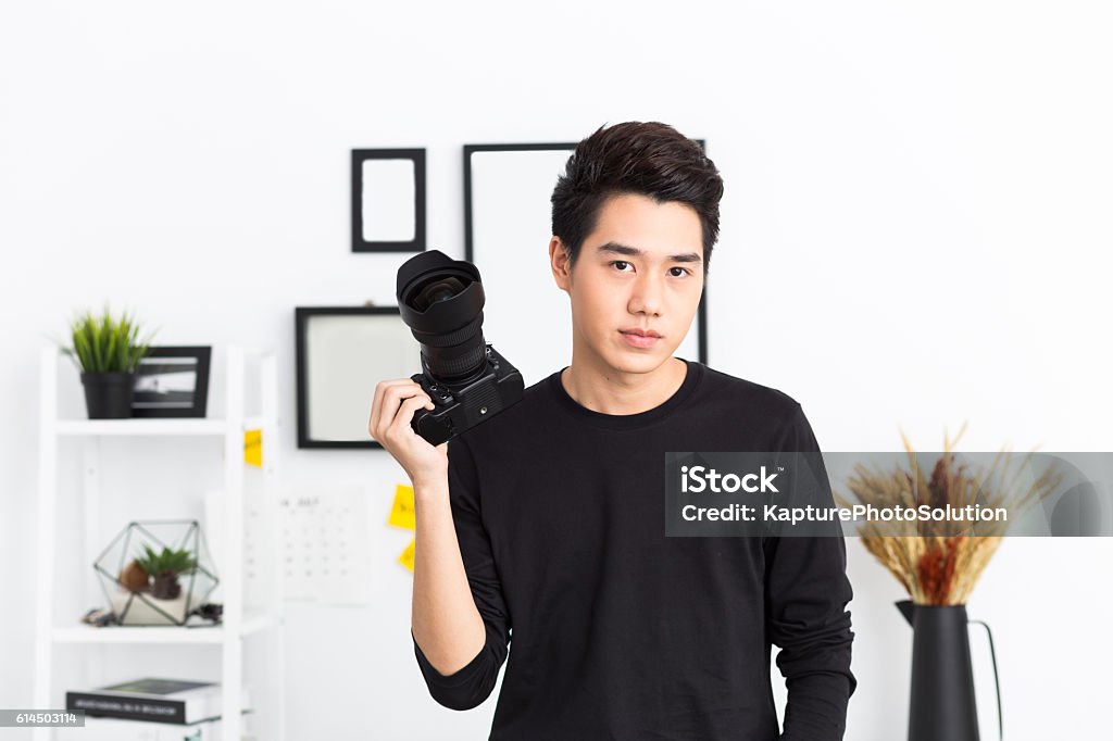 Young asian photographer Photographer Stock Photo