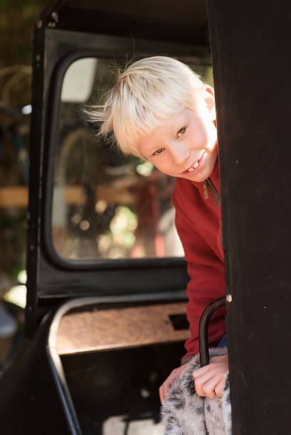 istock Boy in land vehicle, portrait 614504214