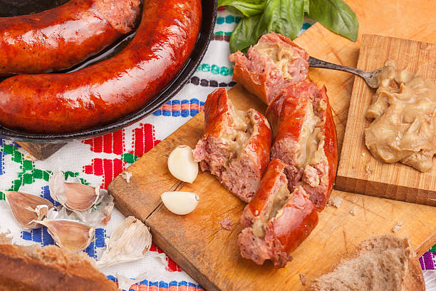 istock Sliced sausages on traditional 614505946
