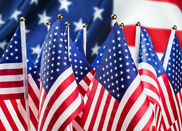 istock small American flags in the background 614506308