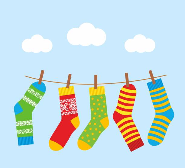 ilustrações, clipart, desenhos animados e ícones de meias coloridas brilhantes em uma corda com pinos de roupa contra - laundry clothing clothesline hanging